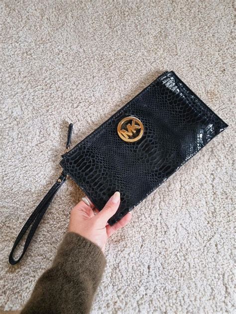 michael kors tasche schlangenmuster schwarz|michael kors wallet.